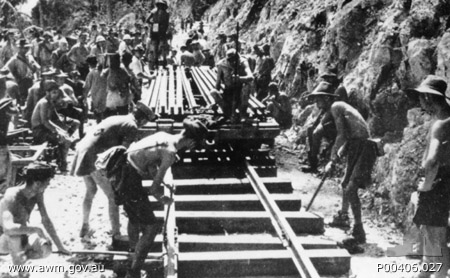 Burma-Thailand Railway. c. 1943. Prisoners of war (POWs) laying railway track 1943-2