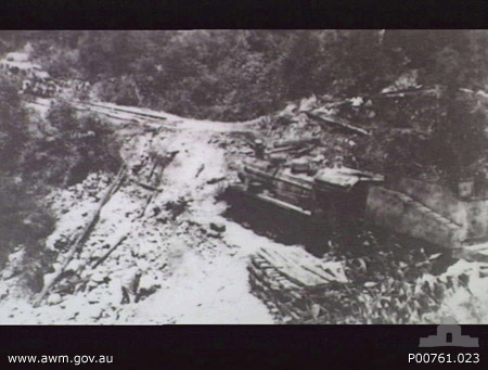 Burma-Thailand Railway. c. September 1945. Site of a railway accident caused by a bridge collapse at the 152 kilometre (Thailand) point Sep 1945