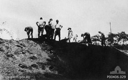 Ronsi, Burma. c. 1943. Prisoners of war (POWs) building the embankment during the construction of the Burma-Thailand railway 1943