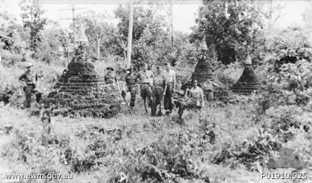 Three Pagoda Pass, Thailand. c. October 1945. Informal group portrait of War Graves Commission survey party members at Three Pagoda Pass, on the Burma Thailand border